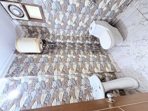 Bathroom in 2 BHK Builder Floor at Khirki Extension – for Sale