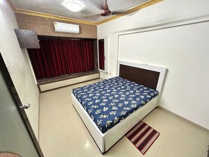 Bedroom in 1 BHK Apartment at Lokhandwala Complex – for Rent