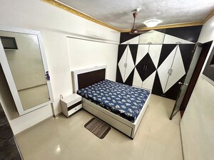 Bedroom in 1 BHK Apartment at Lokhandwala Complex – for Rent