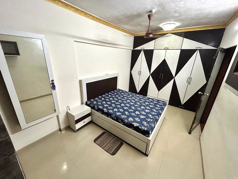 Bedroom, lokhandwala complex 1 Bedroom 600 Sq.Ft. Apartment In Lokhandwala Complex Mumbai 10567807