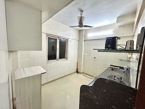 Kitchen in 1 BHK Apartment at Lokhandwala Complex – for Rent