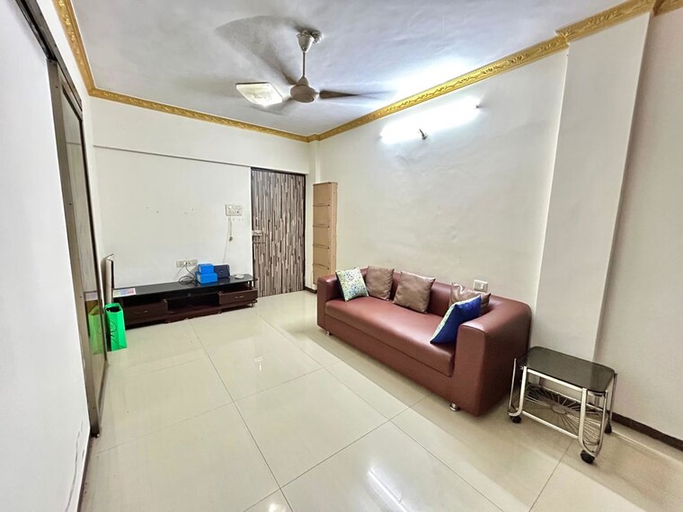 Living Room, lokhandwala complex 1 Bedroom 600 Sq.Ft. Apartment In Lokhandwala Complex Mumbai 10567807