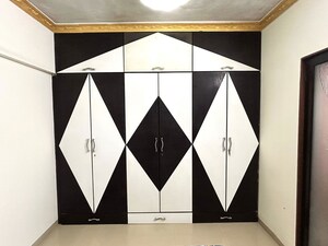 Bedroom in 1 BHK Apartment at Lokhandwala Complex – for Rent