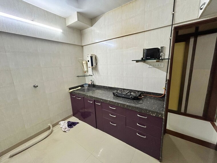 Kitchen, lokhandwala complex 1 Bedroom 600 Sq.Ft. Apartment In Lokhandwala Complex Mumbai 10567807