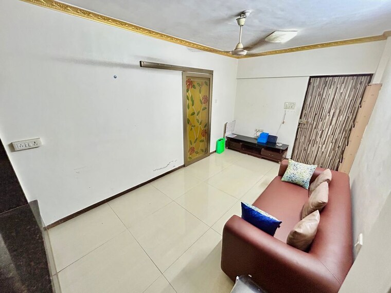 Living Room, lokhandwala complex 1 Bedroom 600 Sq.Ft. Apartment In Lokhandwala Complex Mumbai 10567807