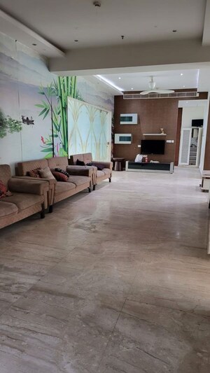 Living Room in 5 BHK Penthouse at Mahagun Marvella, Sector 78 – for Sale