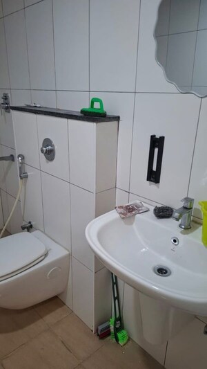Bathroom in 2 BHK Apartment at Godrej Aqua, International Airport Road – for Rent