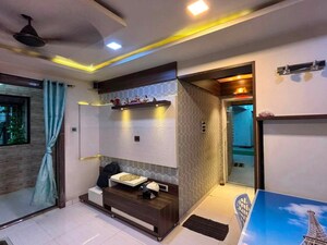 Living Room in 2 BHK Apartment at Swastik Palms CHS, Brahmand – for Rent