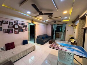 Living Room in 2 BHK Apartment at Swastik Palms CHS, Brahmand – for Rent