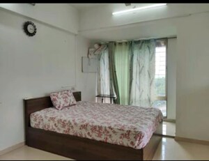 Bedroom in 2 BHK Apartment at Cosmos Lounge, Manpada – for Rent