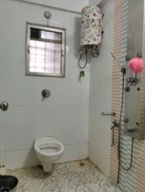 Bathroom in 2 BHK Apartment at Cosmos Lounge, Manpada – for Rent