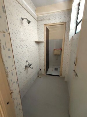 Bathroom in 1 BHK Apartment at Guru Ganesh Nagar Society, Kothrud – for Rent