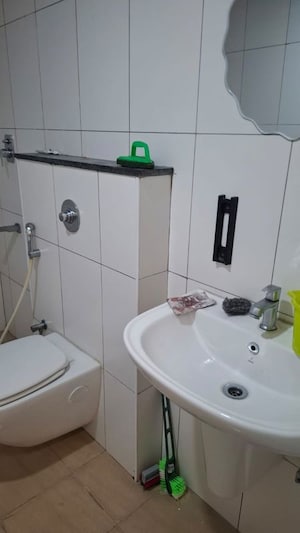 Bathroom in 3 BHK Apartment at Godrej Aqua, International Airport Road – for Rent