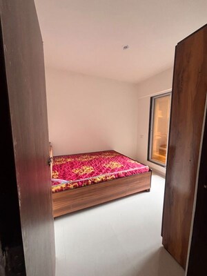 Bedroom in 2 BHK Apartment at PG Tower, Badlapur West – for Sale