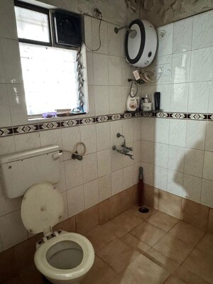 Bathroom in 2 BHK Apartment at Shreeji Paradise, Aundh – for Rent