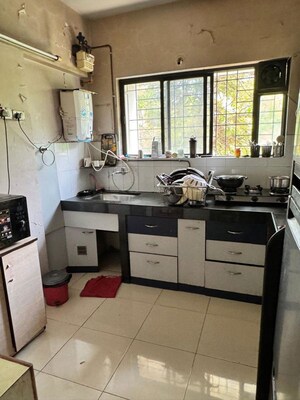 Kitchen in 2 BHK Apartment at Shreeji Paradise, Aundh – for Rent