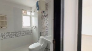 Bathroom in 3 BHK Apartment at Gulshan Vivante, Sector 137 – for Sale