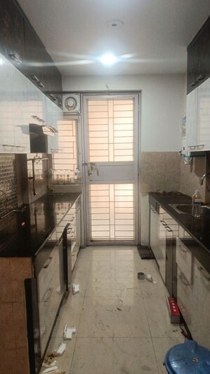 Kitchen in 2.5 BHK Apartment at Sikka Karnam Greens, Sector 143b – for Rent