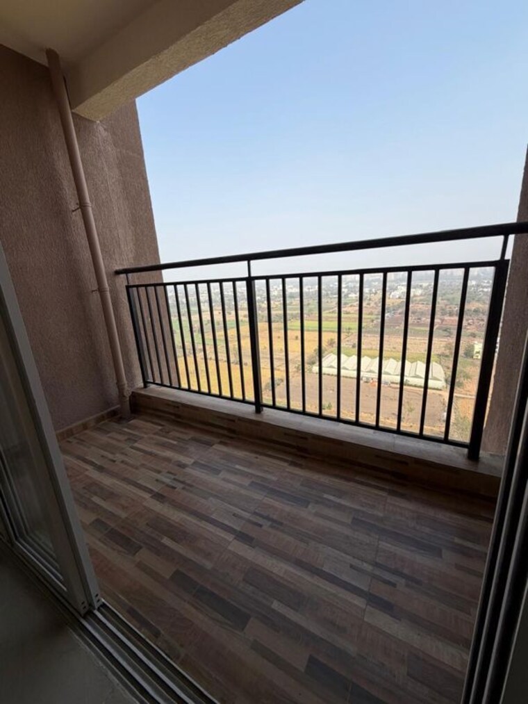 Balcony, kolte-patil-life-republic-16th-avenue-arezo 2 Bedroom 750 Sq.Ft. Apartment In Hinjewadi Pune 10567977