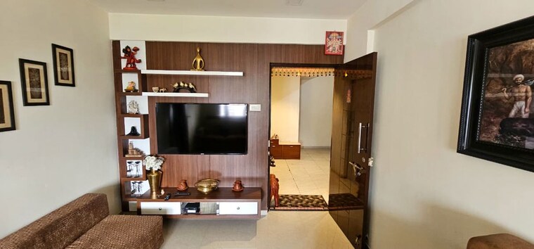 Living Room, vidya-kaka-homes 1 Bedroom 750 Sq.Ft. Apartment In Rahatani Pune 10568017