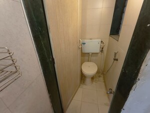Bathroom in 1 BHK Apartment at Puranik City, Kasarvadavali – for Sale
