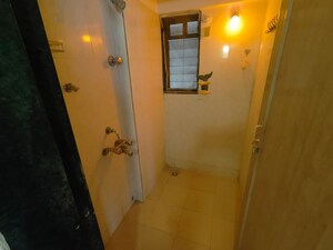 Bathroom in 1 BHK Apartment at Puranik City, Kasarvadavali – for Sale