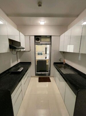 Kitchen in 2 BHK Apartment at Rustomjee Azziano Wing D, Thane West – for Rent
