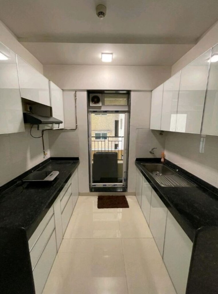 Kitchen, rustomjee-azziano-wing-d 2 Bedroom 700 Sq.Ft. Apartment In Thane West Thane 10568023
