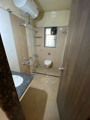 Bathroom in 3 BHK Apartment at Signet Yogeshwar CHS, Dahanukar Colony – for Rent