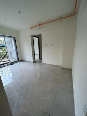 Room in 2 BHK Apartment at Tharwani Vedant Nakshatra, Badlapur West – for Sale