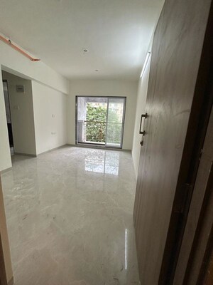Building Lobby in 2 BHK Apartment at Tharwani Vedant Nakshatra, Badlapur West – for Sale