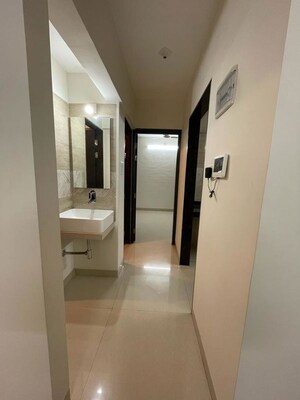 Building Lobby in 2 BHK Apartment at Tharwani Vedant Nakshatra, Badlapur West – for Sale