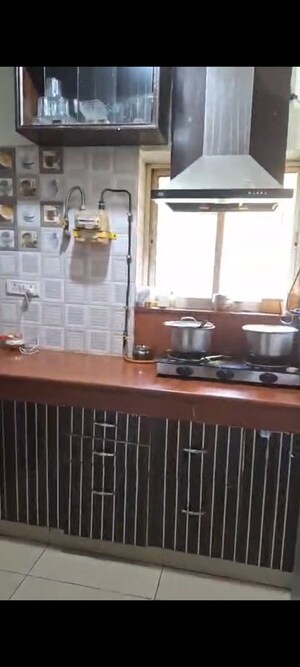 Kitchen in 2 BHK Apartment at RWA Apartments Sector 37, Sector 37 – for Sale