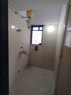Bathroom in 2 BHK Apartment at Damji Mahavir Exotica, Ghodbunder Road – for Rent