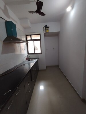 Kitchen in 2 BHK Apartment at Damji Mahavir Exotica, Ghodbunder Road – for Rent