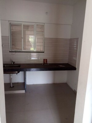 Kitchen in 2 BHK Apartment at Aditya Garden City, Warje – for Sale