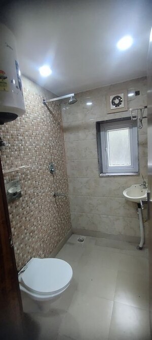 Bathroom in Studio Apartment at DLF Capital Greens Phase I And II, Moti Nagar – for Rent