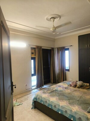 Bedroom in 3 BHK Builder Floor at Nehru Enclave – for Rent