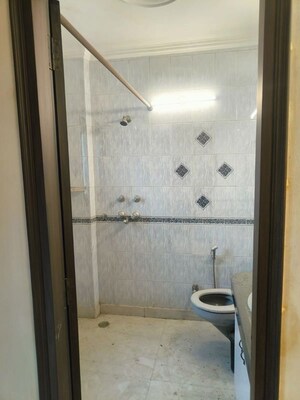 Bathroom in 3 BHK Builder Floor at Nehru Enclave – for Rent