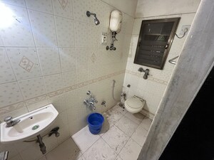 Bathroom in 3 BHK Apartment at Sonal Link Residency, Malad West – for Rent