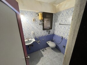 Bathroom in 3 BHK Apartment at Sonal Link Residency, Malad West – for Rent