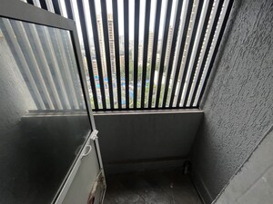 Balcony in 2 BHK Apartment at Shreeji Plaza, Malad West – for Rent