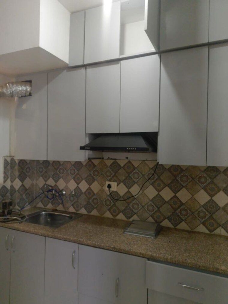 Kitchen, signature-global-proxima-phase-2 2 Bedroom 588 Sq.Ft. Apartment In Sector 89 Gurgaon 10568222