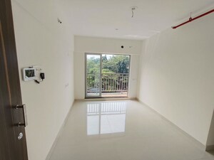 Room in 2 BHK Apartment at Ashar Metro Towers, Vartak Nagar – for Sale