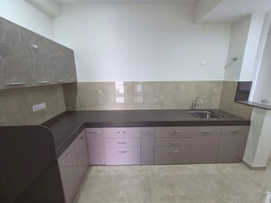 Kitchen in 2 BHK Apartment at Duville Riverdale Grove, Kharadi – for Rent
