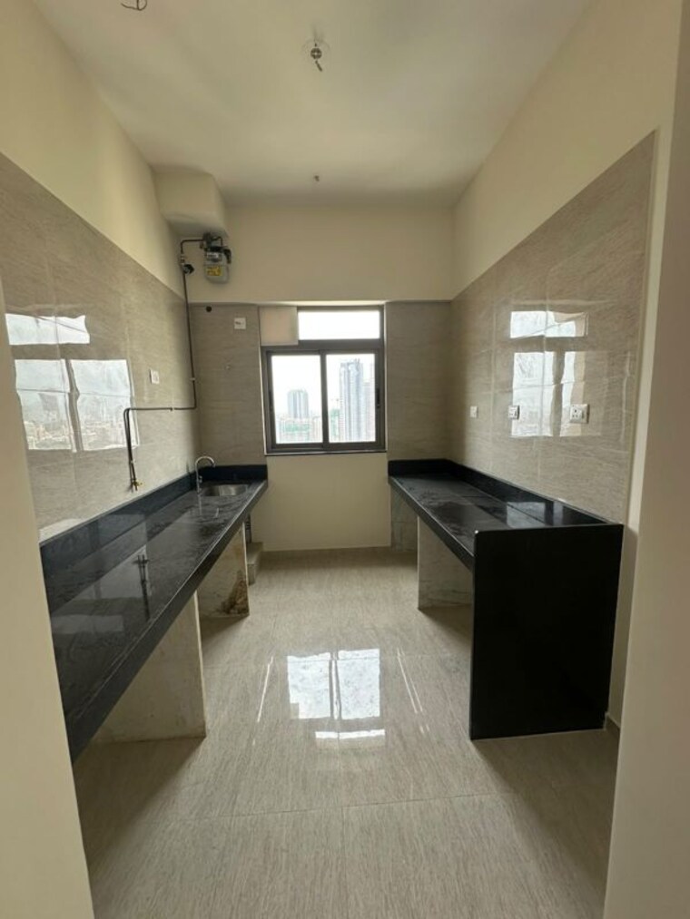 Kitchen, sheth-auris-serenity-tower-3 2 Bedroom 805 Sq.Ft. Apartment In Malad West Mumbai 10568277