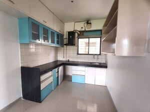 Kitchen in 2 BHK Apartment at Kolte Patil Margosa Heights, Mohammadwadi – for Rent