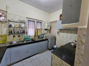 Kitchen in 3 BHK Apartment at Arun Vihar Sector 37, Sector 37 – for Sale