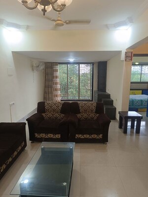 Living Room in 2.5 BHK Apartment at Seawoods Sector 42a – for Rent