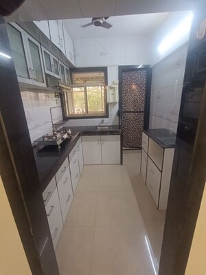 Kitchen in 2.5 BHK Apartment at Seawoods Sector 42a – for Rent